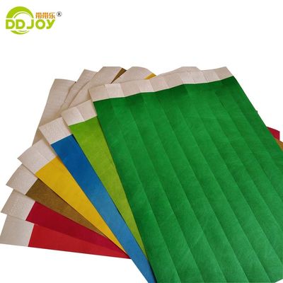 Des bracelets Tyvek simples en orange 100 pcs pour les fournitures d'événement Logo OEM personnalisé