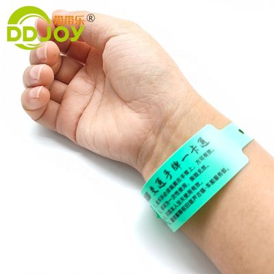 Bracelet d'identification personnalisé en PVC pour les parcs pour enfants et les événements caritatifs en rouge
