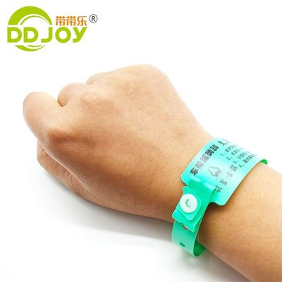Bracelet d'identification personnalisé en PVC pour les parcs pour enfants et les événements caritatifs en rouge