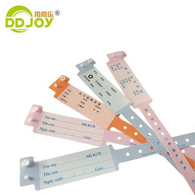 Bracelet jetable en plastique médical orange pour système d'identification d'hôpital sur mesure