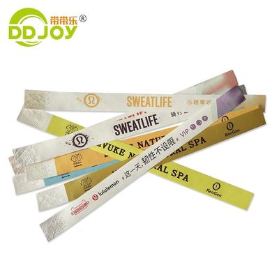 Des bracelets en papier Tyvek sur mesure, résistant à l'eau, imprimés en couleur, des bracelets pour cadeaux d'occasion.